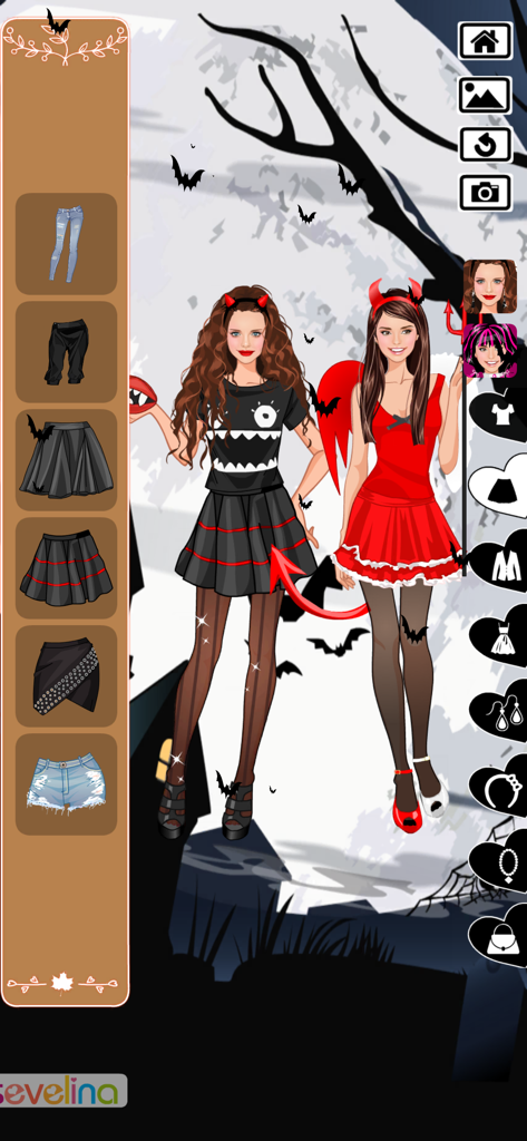 Two characters dressed in Halloween costumes in a fashion dress up game interface