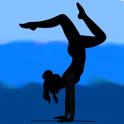 a woman doing a handstand