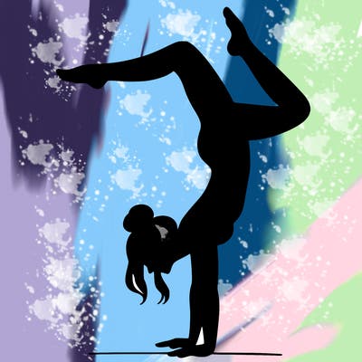 a woman doing a handstand