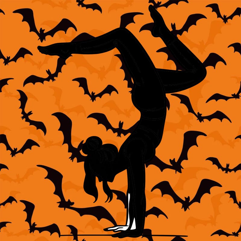 a woman doing a handstand