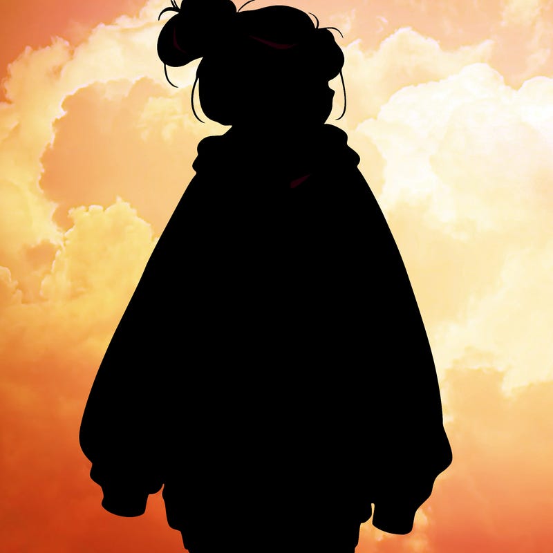 realistic girl with a oversized sweatshirt on and a bun