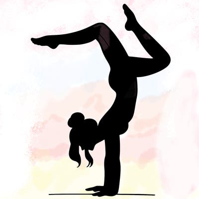 a woman doing a handstand