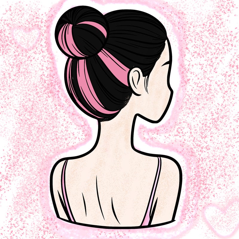 a woman with tight back hair and her face. not covered by any hair.