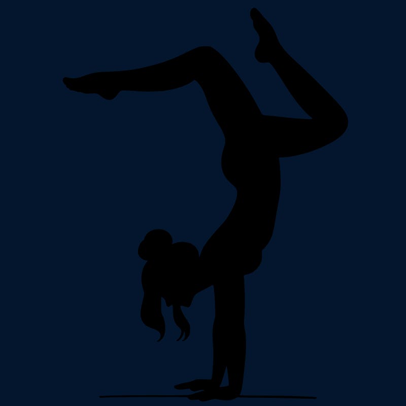 a woman doing a handstand