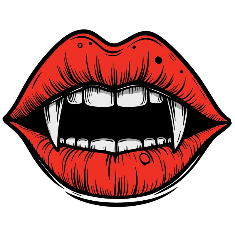 lips with vampire teeth