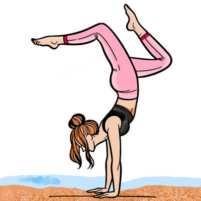 a woman doing a handstand