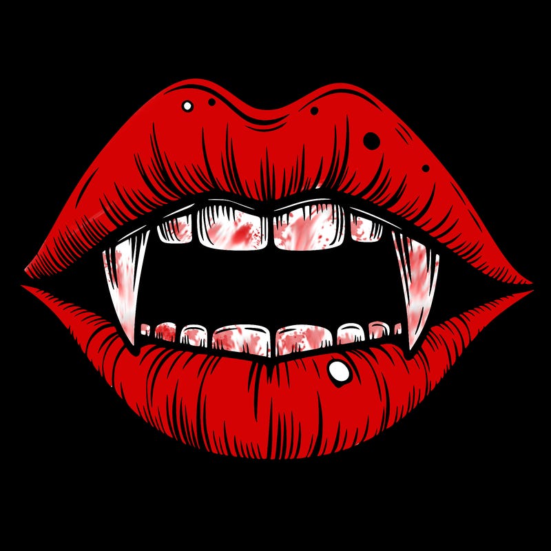 lips with vampire teeth