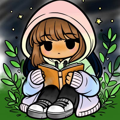 girl in oversized hoodie reading a book