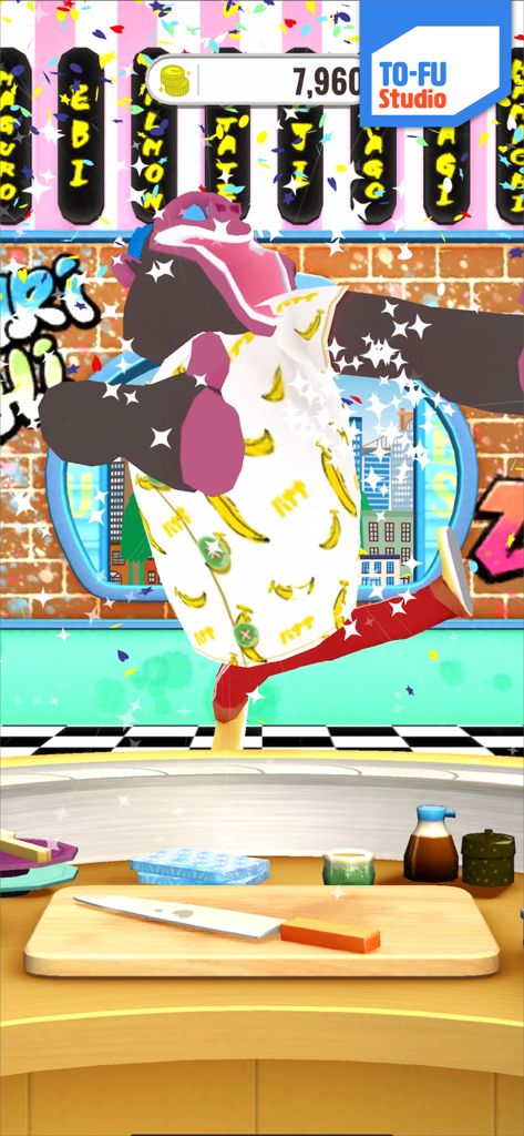 TO-FU Oh!SUSHI 2 - A gorilla character in a banana shirt dances happily in a colorful sushi kitchen with confetti and sparkles