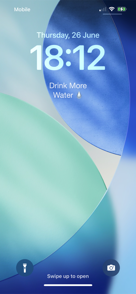 Any Text Widget - Pantalla de bloqueo del iPhone con un widget de texto minimalista para recordar beber más agua.