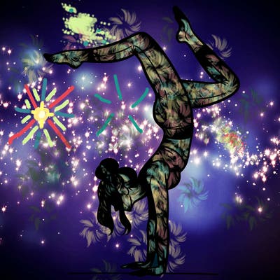 a woman doing a handstand