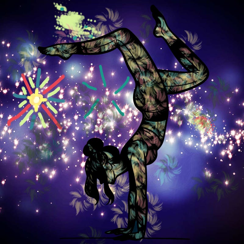 a woman doing a handstand