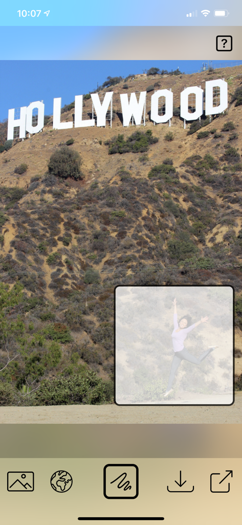 Magic Photo Eraser - Magic Photo Eraser app removing a person from a photo of the Hollywood sign using AI