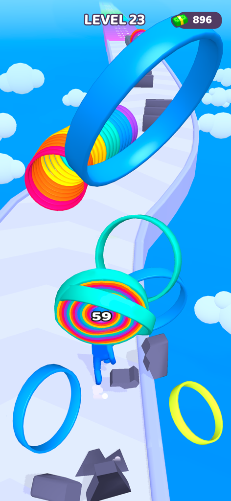 Jugabilidad de Layer Man 3D mostrando a un personaje recogiendo anillos coloridos en una pista celeste para construir un muelle.