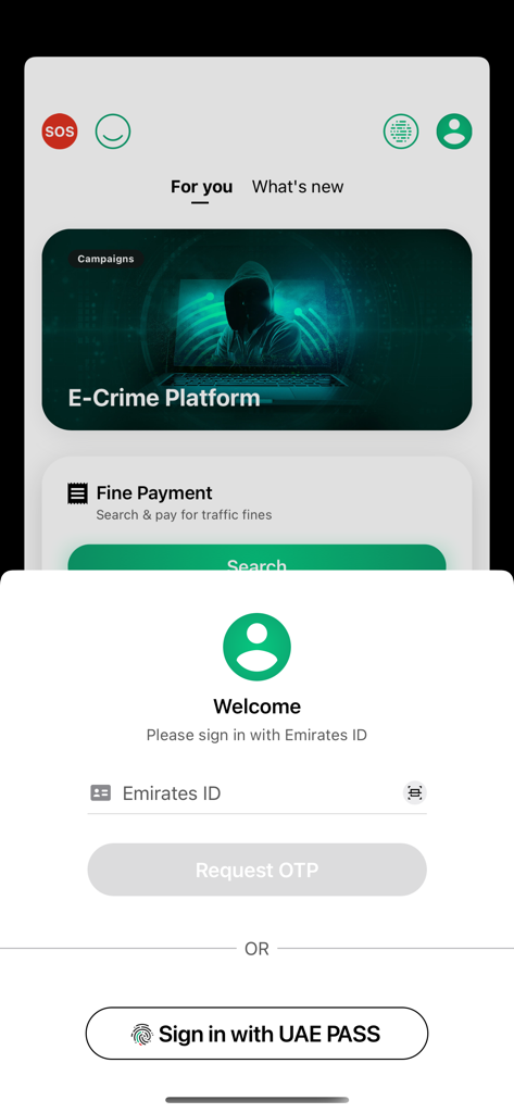 Dubai Police - شرطة دبي - The login screen of the Dubai Police app with options for Emirates ID and UAE PASS.