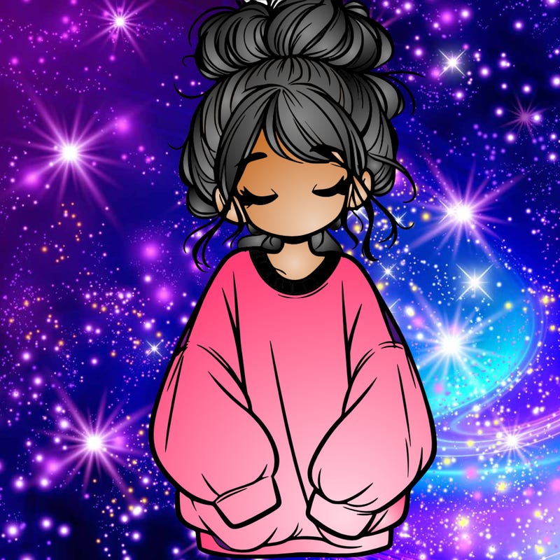 girl with baggy sweatshirt and messy bun