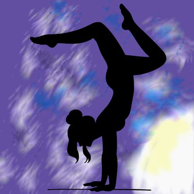 a woman doing a handstand