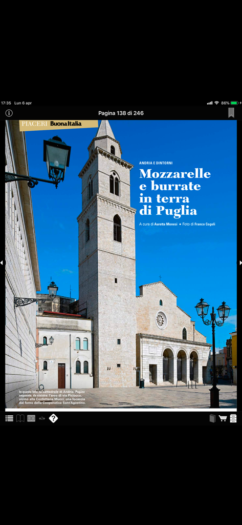 Bell'Italia - Digital magazine page displaying a tall historic bell tower and cathedral in Puglia under a clear blue sky