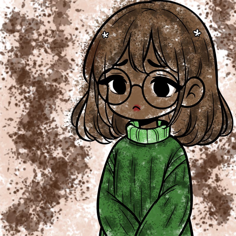 sad girl with glasses in a sweater