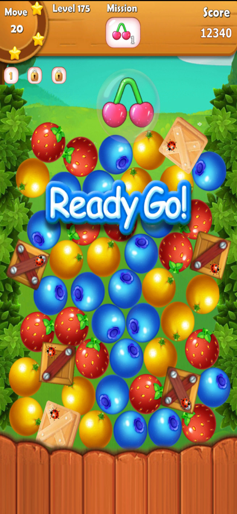 Fruit Link - Line Blast - Un écran de puzzle coloré Fruit Link montrant des fraises et des myrtilles avec un message 'Prêt, Partez'.