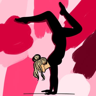 a woman doing a handstand