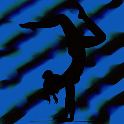 a woman doing a handstand