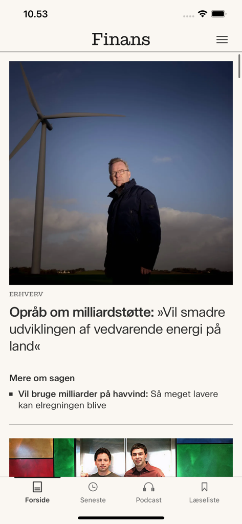 Finans - Danmarks erhvervsavis - Screenshot dell'app Finans che mostra un articolo di business sull'energia rinnovabile con una turbina eolica e un professionista delle notizie.