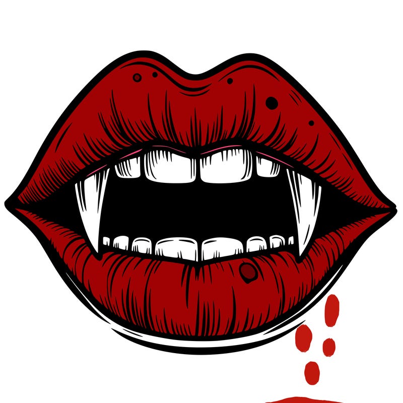 lips with vampire teeth