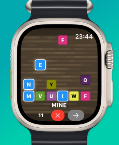 QuickWords - Word Puzzle Game - Gameplay of QuickWords word puzzle game on an Apple Watch displaying falling letter tiles and a formed word.