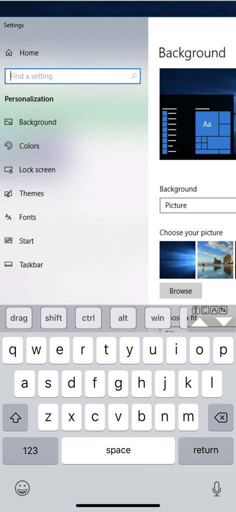 特殊なオンスクリーンキーボードを備えたWindowsの個人設定画面へのリモートデスクトップアクセスを示すiPhone画面