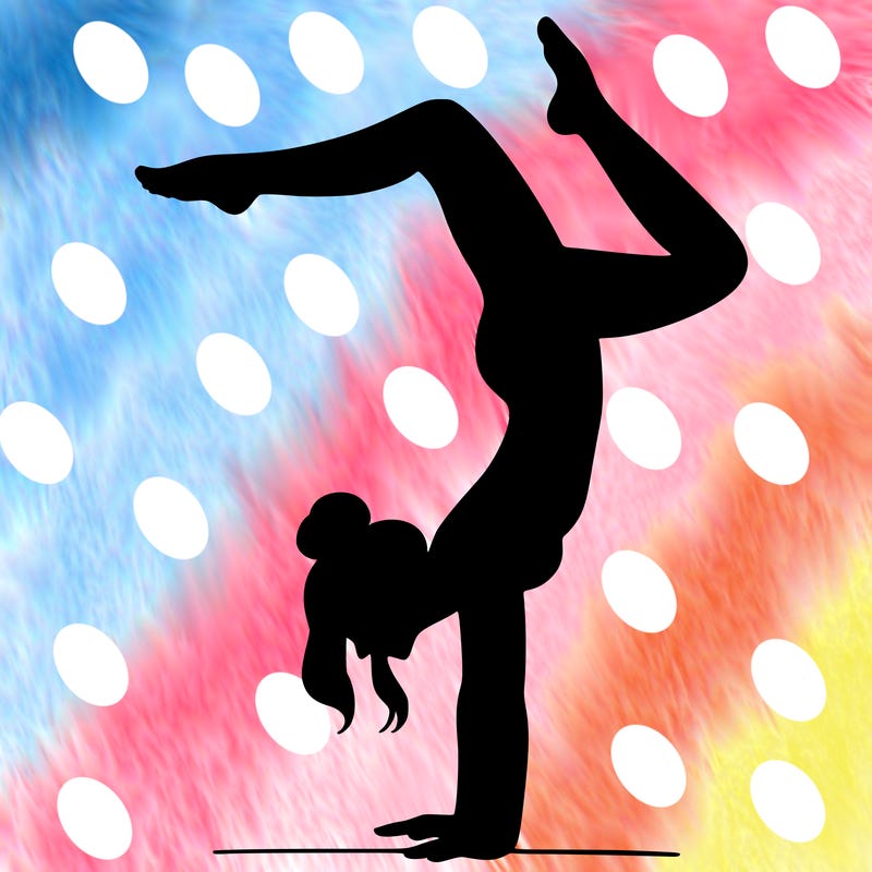 a woman doing a handstand