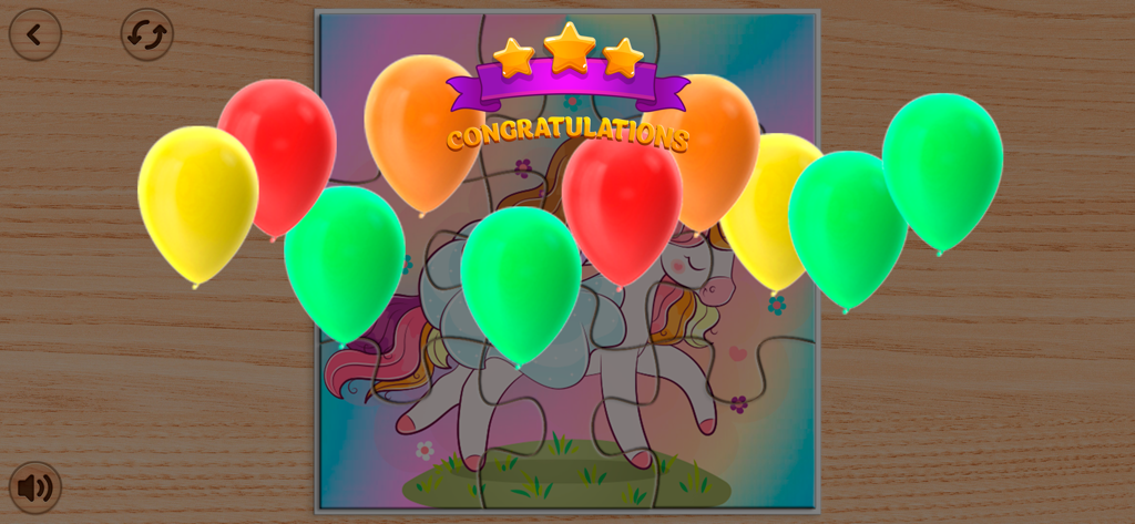 Unicorn Puzzles Game for Girls - Rompecabezas de unicornio completado en el juego con globos coloridos y un banner de felicitaciones
