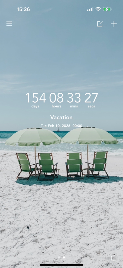 Écran de l'application Countdown affichant un minuteur de vacances avec un arrière-plan de plage pittoresque et des chaises vertes