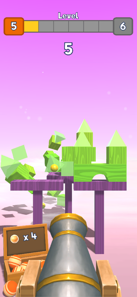 Knock Balls 게임에서 녹색 나무 성 구조물을 조준하고 있는 대포