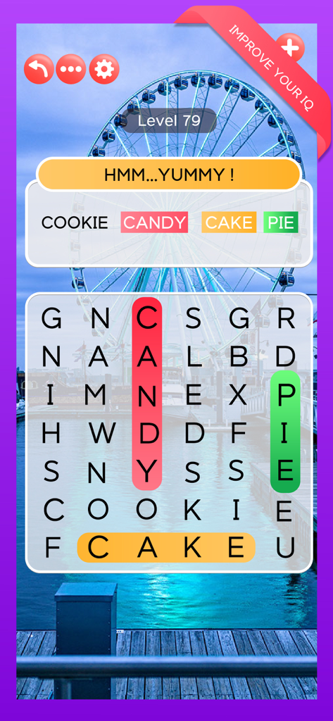 Word search gameplay from Word Voyage showing found words and a scenic ferris wheel background.