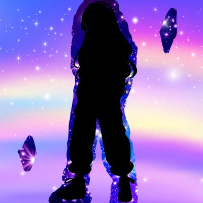 girl in baggy pants crop top and long hair