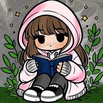 girl in oversized hoodie reading a book