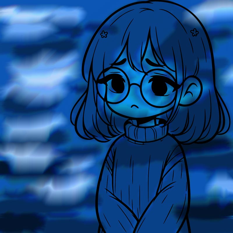 sad girl with glasses in a sweater