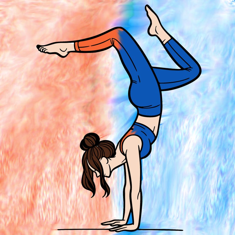 a woman doing a handstand