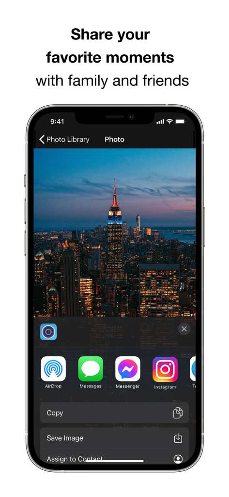 GoCamera – PlayMemories Mobile - A smartphone displaying the GoCamera app share menu with options to send a photo of the New York City skyline to social media apps