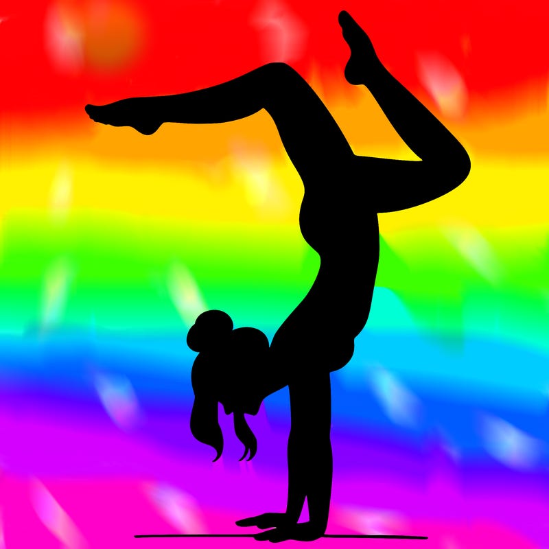 a woman doing a handstand