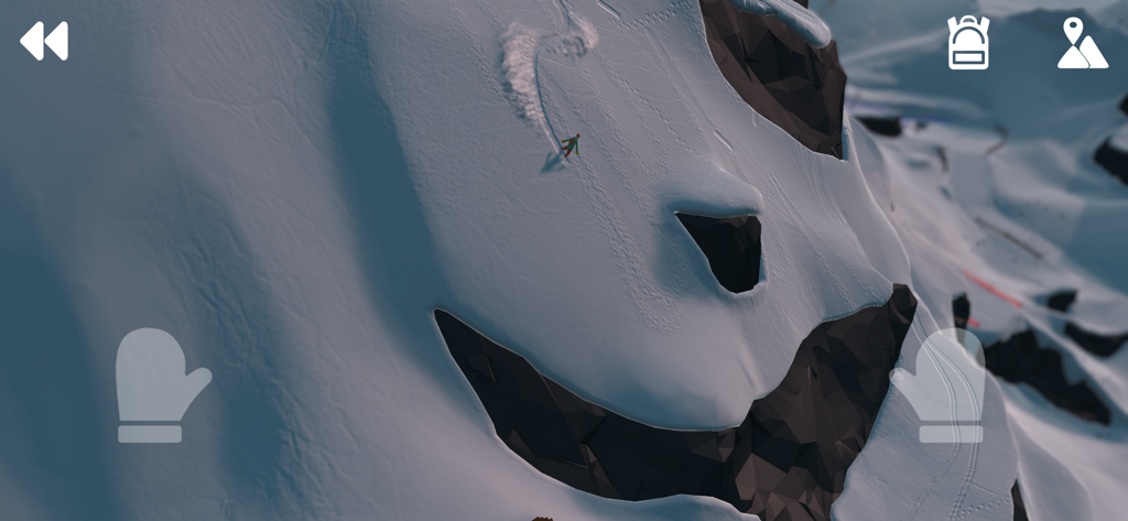 Grand Mountain Adventure - A top down view of a skier carving through fresh powder on a steep mountain peak in Grand Mountain Adventure.