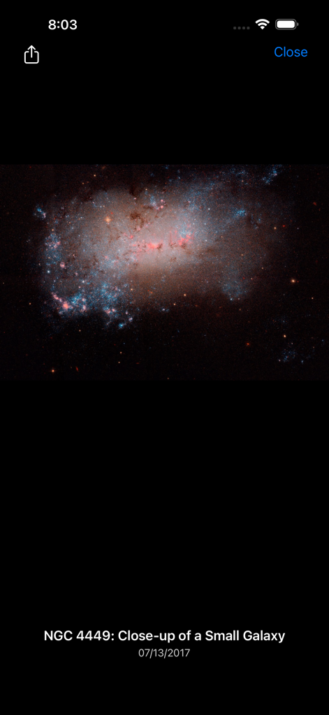 mySpaceHub - A close-up high-resolution image of the NGC 4449 small galaxy within the mySpaceHub app.