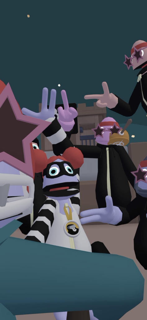 Yeeps Companion - A group of Yeeps avatars with star glasses posing together for a photo in a virtual environment