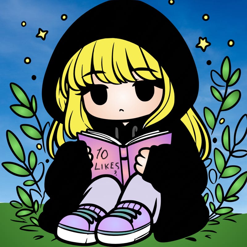 girl in oversized hoodie reading a book