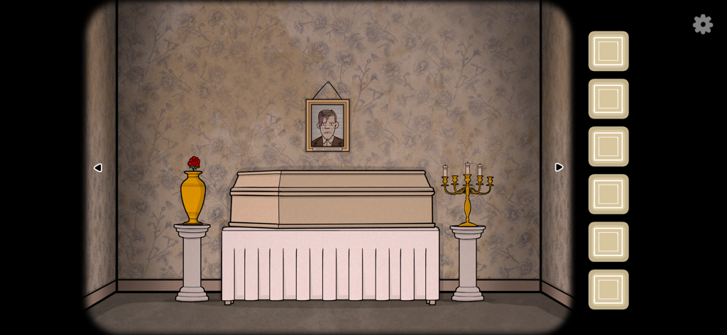 Una habitación en The Past Within que muestra un ataúd debajo de un retrato de Albert Vanderboom con una rosa y un candelabro