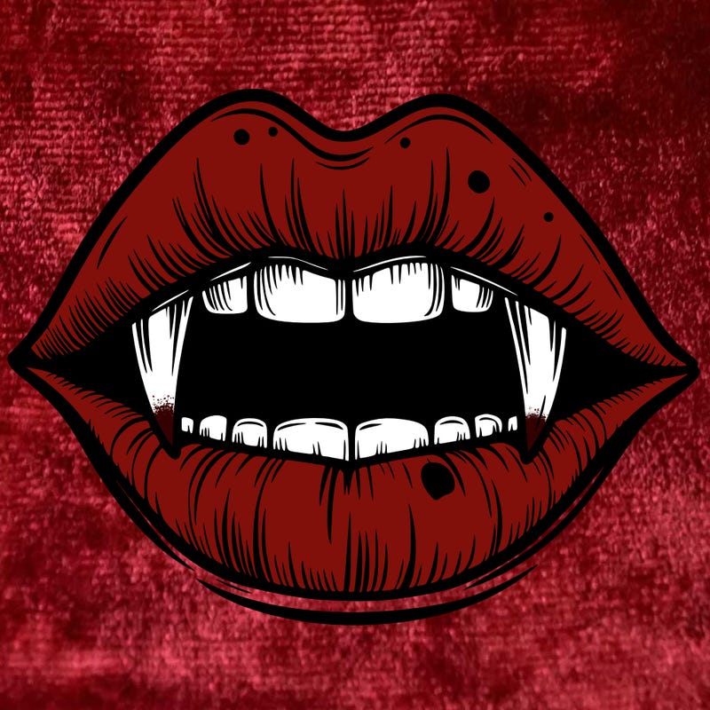 lips with vampire teeth