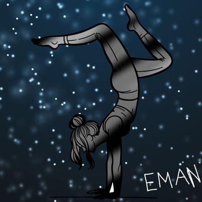 a woman doing a handstand