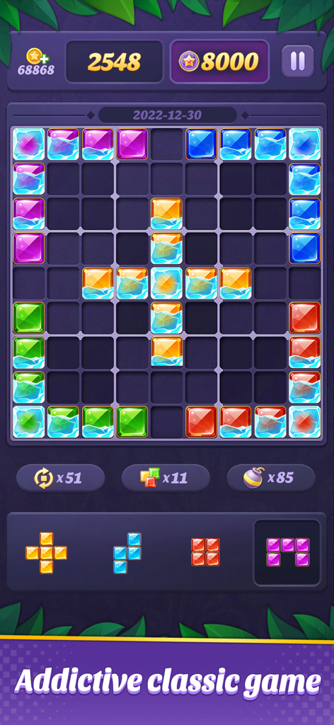 Gameplay screenshot of Block Puzzle 99 showing a 9x9 grid with colorful gem blocks and power-up tools