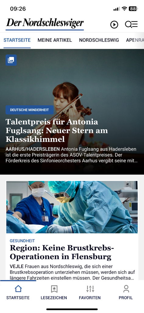 Pantalla de inicio de la aplicación de noticias Der Nordschleswiger con artículos en alemán y menú de navegación.